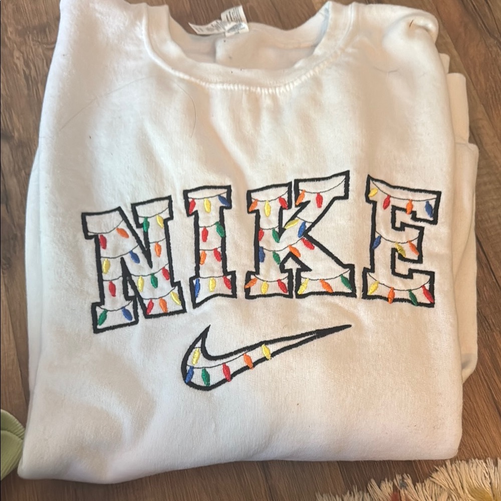 Nike White Sweatshirt with Festive Accents